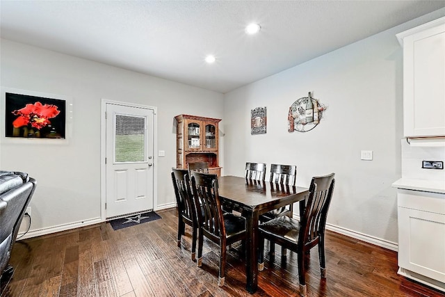 1304 Eagle Ridge Trl, Leander, TX 78641 - dining space with dark wood-style floors and recessed lighting
