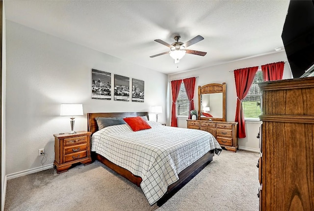 1304 Eagle Ridge Trl, Leander, TX 78641 - carpeted bedroom with baseboards and a ceiling fan