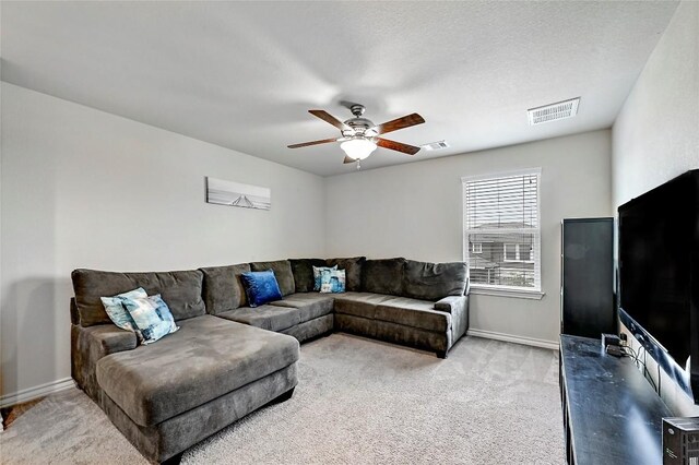 1304 Eagle Ridge Trl, Leander, TX 78641 - carpeted living area featuring ceiling fan and baseboards