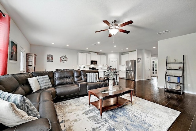1304 Eagle Ridge Trl, Leander, TX 78641 - living area featuring a ceiling fan, dark wood-type flooring, and recessed lighting