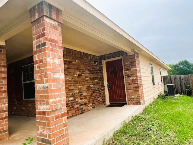 5105 Bantom Woods Bnd, Austin, TX 78724 - property entrance with brick siding and cooling unit