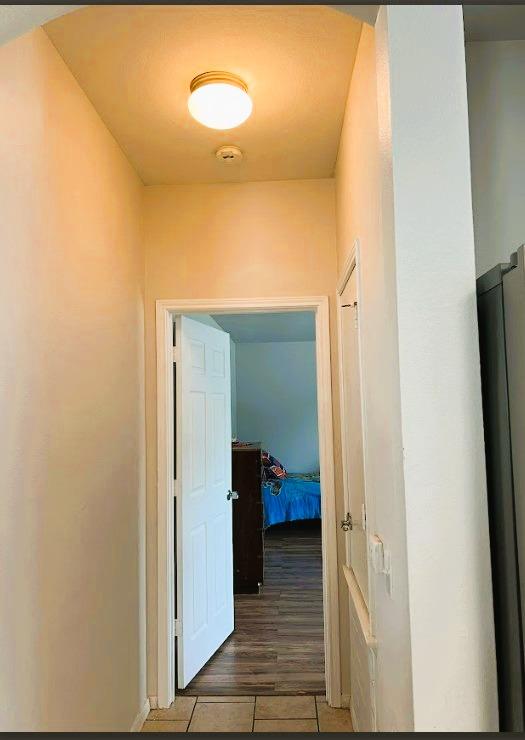 5105 Bantom Woods Bnd, Austin, TX 78724 - corridor featuring tile patterned flooring and baseboards