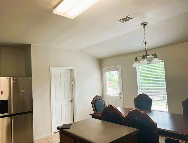 5105 Bantom Woods Bnd, Austin, TX 78724 - dining area with lofted ceiling and light tile patterned flooring