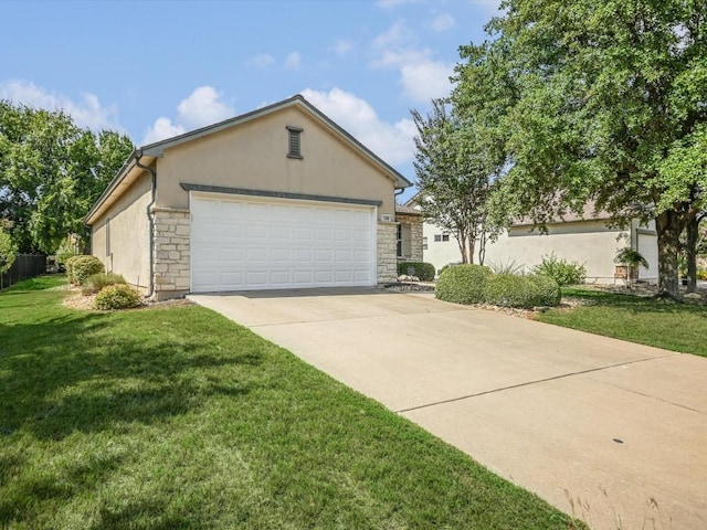 708 Texas Dr, Georgetown, TX 78633 - view of front of house featuring stone siding, stucco siding, and concrete driveway