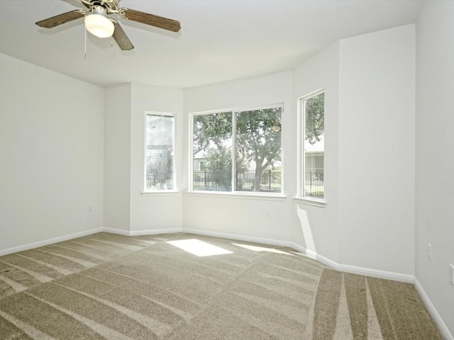 708 Texas Dr, Georgetown, TX 78633 - spare room featuring carpet, a ceiling fan, and baseboards