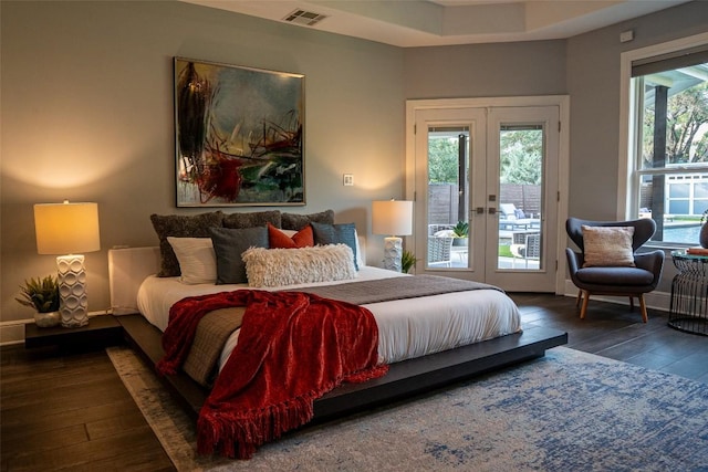 1004 Ruth Ave, Austin, TX 78757 - bedroom with french doors, access to outside, and hardwood / wood-style flooring