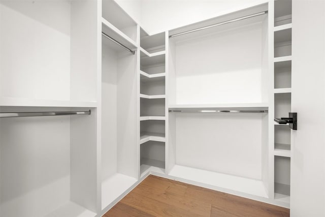 1305 Walnut Ave, Austin, TX 78702 - spacious closet featuring wood finished floors