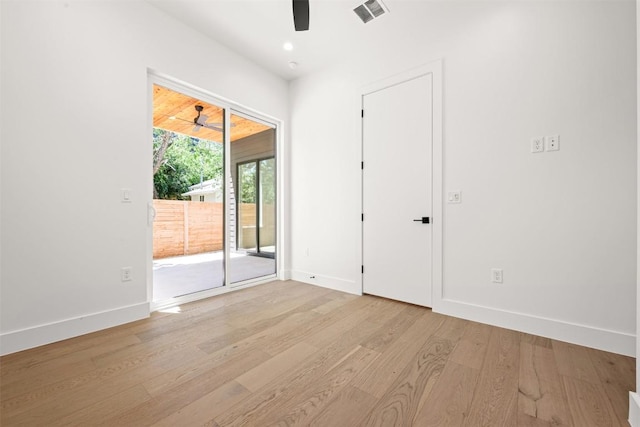 1305 Walnut Ave, Austin, TX 78702 - empty room with a ceiling fan, baseboards, light wood-style flooring, and recessed lighting