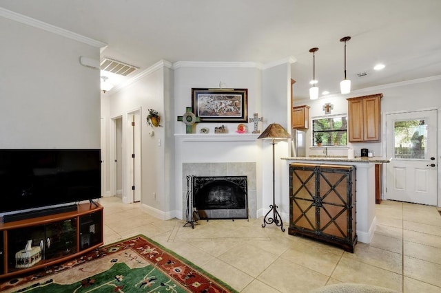 9912 Little Creek Cir, Dripping Springs, TX 78620 - living room featuring ornamental molding, light tile patterned floors, baseboards, a fireplace, and recessed lighting