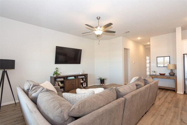 2208 Mcclendon Trl, Leander, TX 78641 - living area with light wood-style flooring, a ceiling fan, baseboards, and recessed lighting
