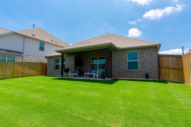 2208 Mcclendon Trl, Leander, TX 78641 - rear view of property featuring brick siding and a patio
