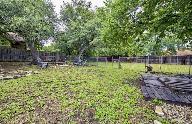 15100 N Flamingo Dr, Austin, TX 78734 - view of yard with a fire pit and a deck