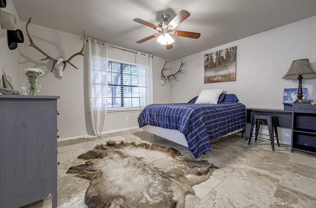 15100 N Flamingo Dr, Austin, TX 78734 - bedroom with baseboards and a ceiling fan