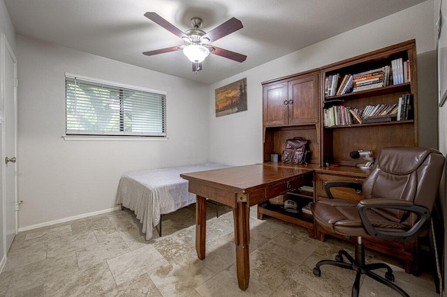 15100 N Flamingo Dr, Austin, TX 78734 - bedroom with an office area, baseboards, and ceiling fan