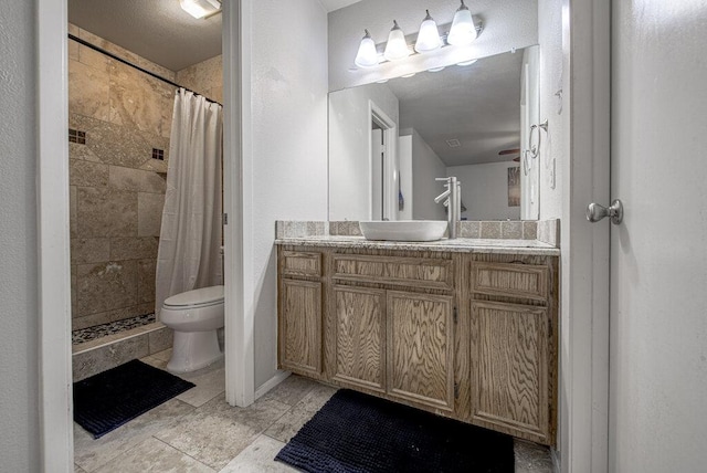 15100 N Flamingo Dr, Austin, TX 78734 - full bathroom with toilet, vanity, and tiled shower