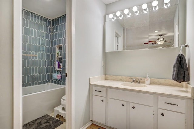 2714 Inridge Dr, Austin, TX 78745 - full bathroom with vanity, toilet, ceiling fan, and tub / shower combination