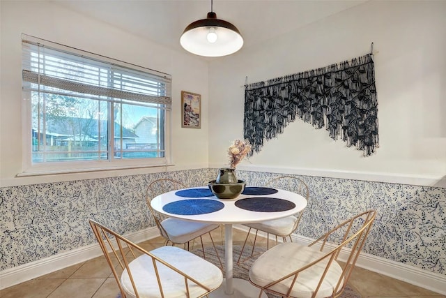 2714 Inridge Dr, Austin, TX 78745 - tiled dining space featuring baseboards