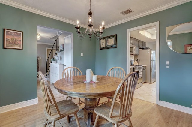 2714 Inridge Dr, Austin, TX 78745 - dining space with a chandelier, stairs, ornamental molding, baseboards, and light wood finished floors