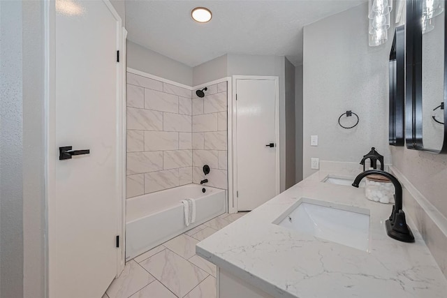 7614 Andiron Cir, Houston, TX 77041 - bathroom featuring double vanity,  shower combination, and marble finish floors