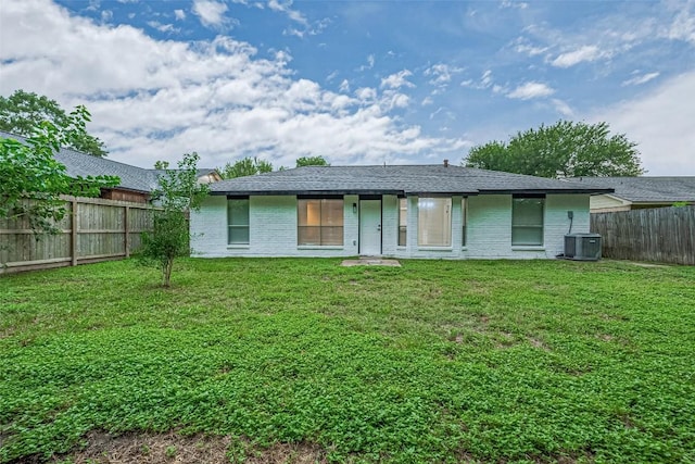 7614 Andiron Cir, Houston, TX 77041 - back of property with brick siding and central AC