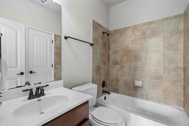 3904 Avery Woods Ln, Cedar Park, TX 78613 - full bath with vanity, toilet, washtub / shower combination, and a textured wall
