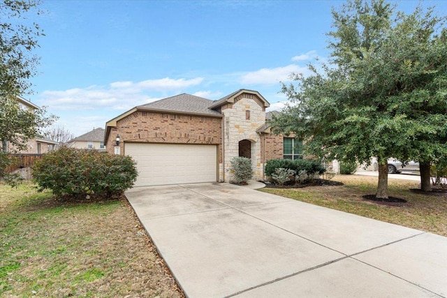 3408 Glastonbury Trl, Pflugerville, TX 78660 - french country inspired facade with an attached garage, driveway, and stone siding