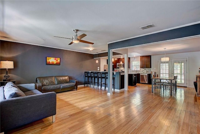 1706 Ridgemont Dr, Austin, TX 78723 - living area featuring a ceiling fan, light wood-style flooring, and baseboards