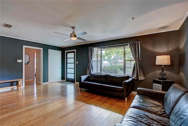 1706 Ridgemont Dr, Austin, TX 78723 - living room with light wood-type flooring, ceiling fan, and baseboards