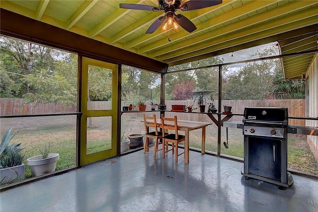 1706 Ridgemont Dr, Austin, TX 78723 - sunroom featuring finished concrete floors and wood ceiling with exposed beams