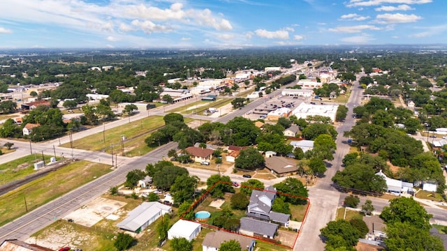 116 S Hackberry Ave, Luling, TX 78648 - aerial overview of property's location with property parcel outlined and nearby suburban area