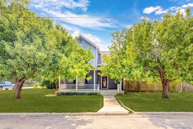 116 S Hackberry Ave, Luling, TX 78648 - view of property hidden behind natural elements with a porch