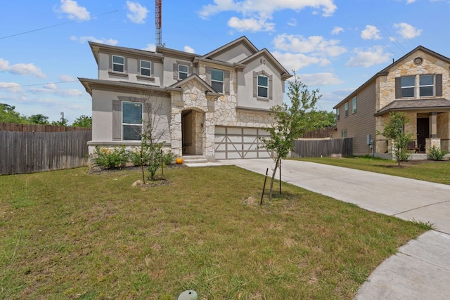 195 Azure Cv, Kyle, TX 78640 - view of front facade with stone siding, driveway, a garage, and stucco siding