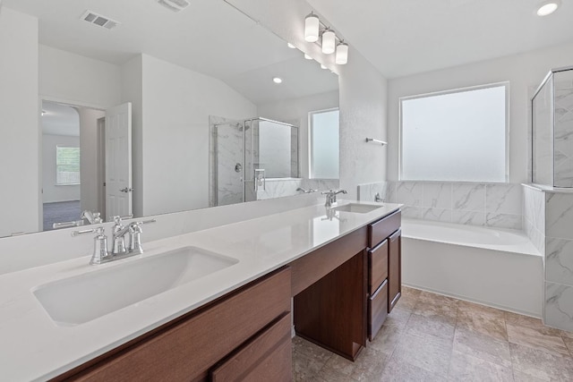 195 Azure Cv, Kyle, TX 78640 - full bath with a stall shower, double vanity, a bath, and recessed lighting