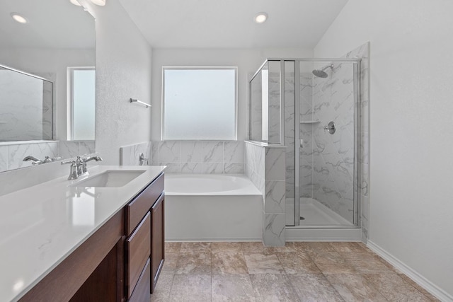 195 Azure Cv, Kyle, TX 78640 - bathroom with vanity, a bath, a marble finish shower, and recessed lighting