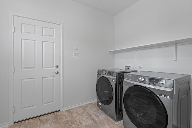 195 Azure Cv, Kyle, TX 78640 - laundry room with washer and dryer and baseboards