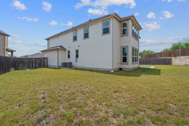 195 Azure Cv, Kyle, TX 78640 - back of property featuring central AC unit