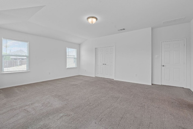 195 Azure Cv, Kyle, TX 78640 - unfurnished bedroom with carpet flooring, baseboards, and a closet
