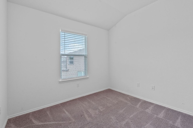 195 Azure Cv, Kyle, TX 78640 - empty room with carpet, lofted ceiling, and baseboards