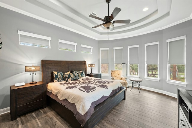 7617 Lazy River Cv, Austin, TX 78730 - bedroom featuring a raised ceiling, baseboards, dark wood finished floors, crown molding, and recessed lighting