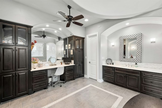 7617 Lazy River Cv, Austin, TX 78730 - full bath featuring ceiling fan, recessed lighting, vanity, lofted ceiling, and tile patterned flooring