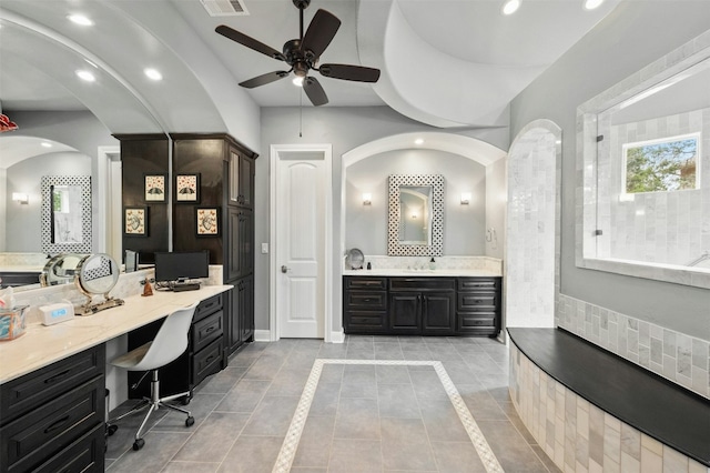 7617 Lazy River Cv, Austin, TX 78730 - bathroom with ceiling fan, vanity, recessed lighting, a tub, and baseboards