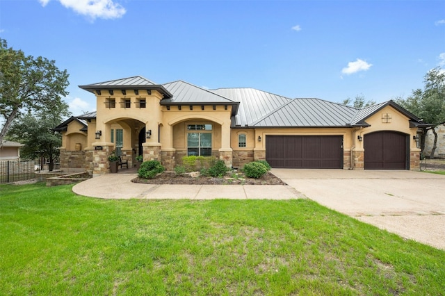 7617 Lazy River Cv, Austin, TX 78730 - mediterranean / spanish-style home featuring a standing seam roof, stucco siding, an attached garage, stone siding, and concrete driveway
