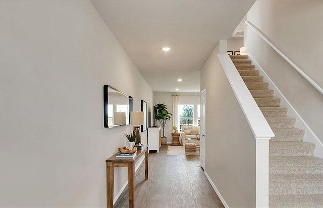 188 Grey Slate Ave, Marble Falls, TX 78654 - corridor featuring stairs, wood finished floors, recessed lighting, and baseboards