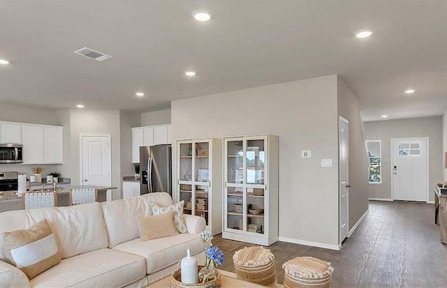 188 Grey Slate Ave, Marble Falls, TX 78654 - living area featuring dark wood-type flooring, recessed lighting, and baseboards