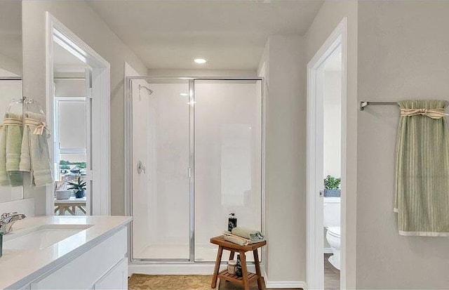 188 Grey Slate Ave, Marble Falls, TX 78654 - full bath featuring a stall shower, vanity, toilet, and recessed lighting