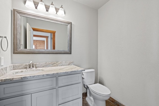180 Bradley Ln, Rosanky, TX 78953 - bathroom with toilet and vanity