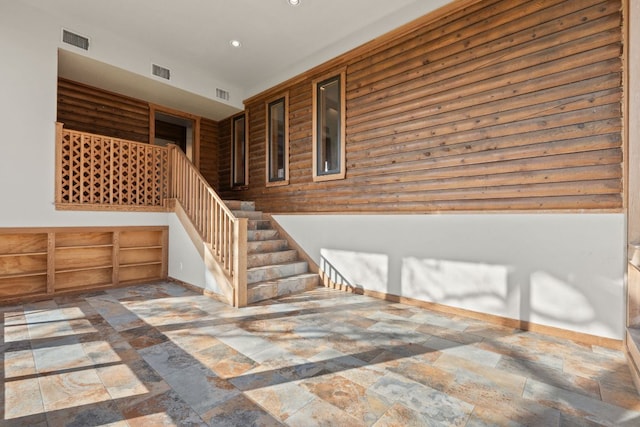 180 Bradley Ln, Rosanky, TX 78953 - stairs featuring stone tile floors and recessed lighting