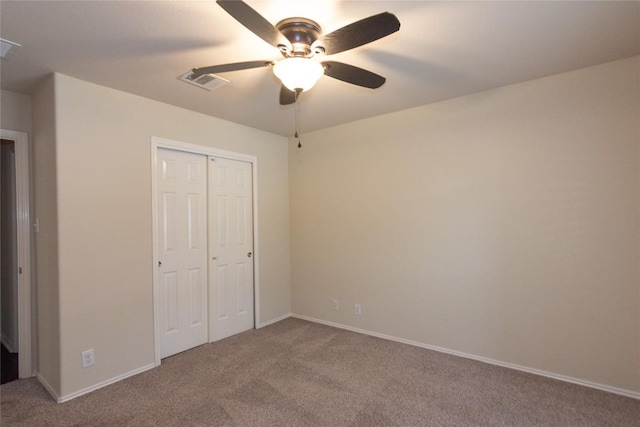 1811 Sand Creek Rd, Cedar Park, TX 78613 - unfurnished bedroom with carpet flooring, a closet, baseboards, and ceiling fan