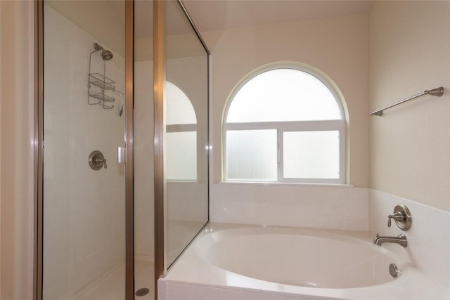1811 Sand Creek Rd, Cedar Park, TX 78613 - full bath with healthy amount of natural light, a bath, and a stall shower