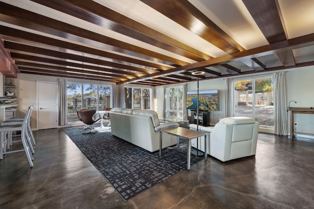 421 Yucca Dr, Kingsland, TX 78639 - living room featuring beamed ceiling and concrete flooring